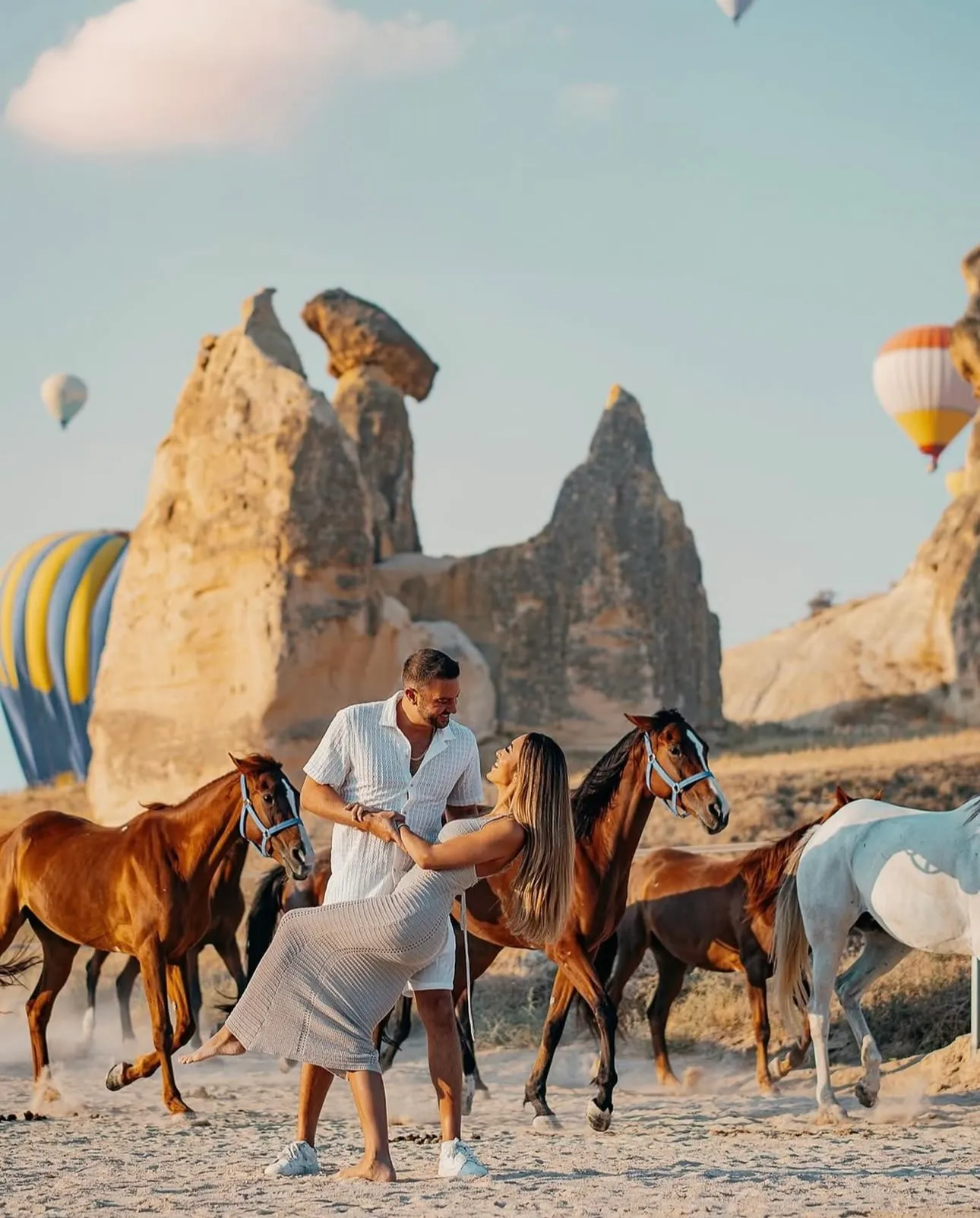 Horses and riders in Cappadocia